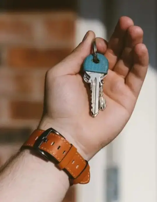 Peak Locksmith commercial technician at a Tacoma, WA business entrance